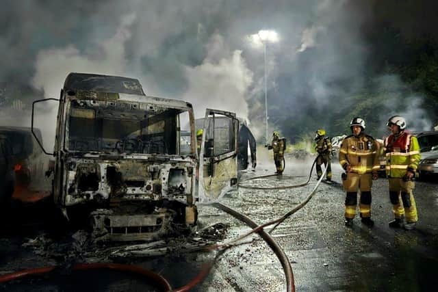 More than 50 cars have been torched in a suspected arson attack overnight