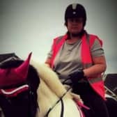 Michelle Hanney pictured riding a horse. (DWP/SWNS)