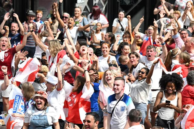 England fans celebrate Lauren Hemp's goal at the Croydon Boxpark during the Women's World Cup semifinal between England and Australia. London. Wednesday 16 2023.