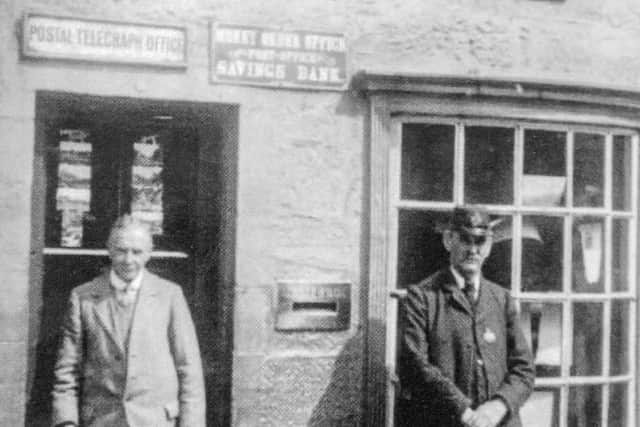 Undated collect photo of Matthew Hogart, Postmaster 1908-1983 and George Stoddart, Postman at Sanquhar Post Office in Dumfries and Galloway (SWNS)