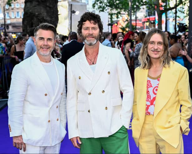 Take That (L-R) Gary Barlow, Howard Donald and Mark Owen  (Photo by Gareth Cattermole/Getty Images)