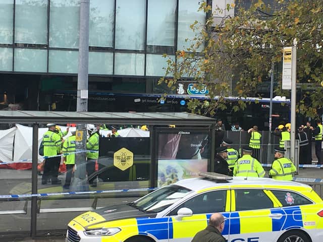 The scene in Piccadilly Gardens just after the crash on Monday lunchtime