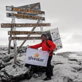 Michael Copeland from Stafford, on his climb up Kilimanjaro with a fridge on his back. The former soldier has conquered Africa's highest mountain whilst carrying a fridge on his back to encourage men to talk about mental health with MIND.