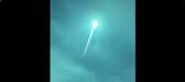 Blue fireball shoots across night sky in Europe.