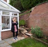 Lucy Gawthorpe at her home where a wall has collapsed. 