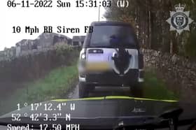 Land Rover driver reverse rams police car.