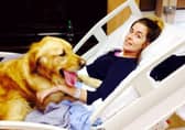 Jenna Fitzgerald with her golden retriever Cooper.