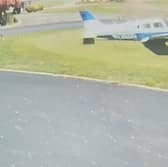 Plane smashes into golf course narrowly missing golfer.
