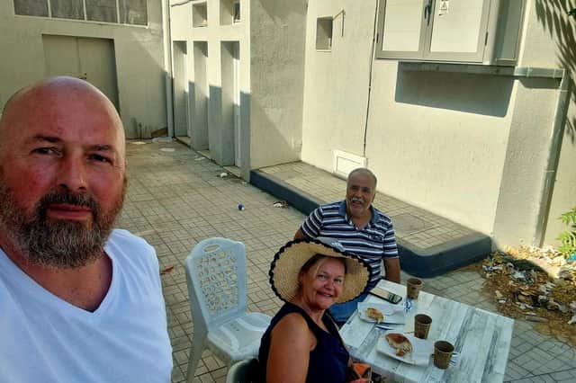 James and Louise Colley with their driver in Tunisia.