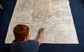 Jake Daniels-Shipsmith with his incredible city map which he has been working on for seven years. 