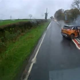 Norman Chai smashes into oncoming traffic as he loses control after overtaking a lorry.