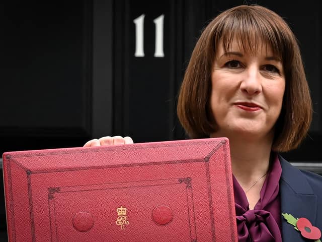 Rachel Reeves poses with the red Budget Box as she leaves 11 Downing Street to present the government's annual Autumn budget to Parliament (Photo: JUSTIN TALLIS/AFP via Getty Images)