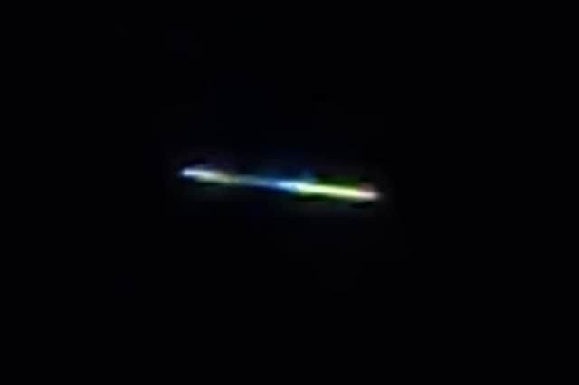 The 'UFO' hovers in the sky.