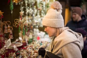 Shoppers at a Christmas market. 