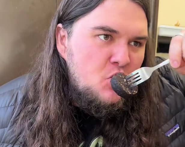 Kalani Smith reviewing a full English breakfast. British cafe goes viral after US TikToker gives glowing reviews of a full English breakfast.