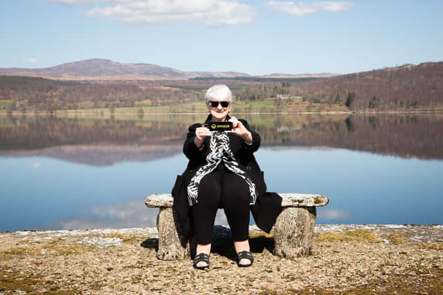 Patricia Moule,  Omaze Winner outside her new £4m home in Scotland.