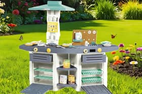 The Dolu play kitchen is durable enough to be used in the garden 