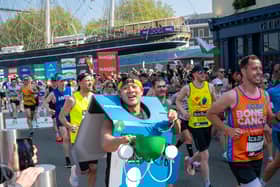 Man runs marathon dressed in Domino's Pizza box