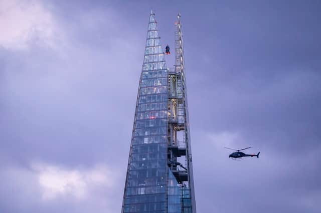 The 11ft sculpture of the iconic superhero based on star David Corenswet is suspended 1,000ft