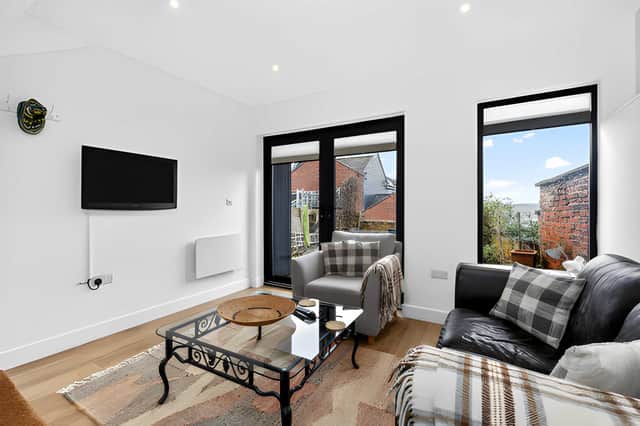 The main cottage's reception space reflects the character-led feel of the Grade II listed home