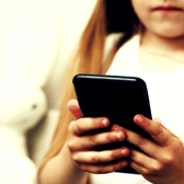 A first phone can bring independence, along with new questions for parents about online safety.  