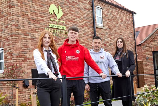 Pictured, from left, are Beal Sales Executive Eden Kennedy, Immingham Town FC Vice-Captain Alfie Davy and First Team Manager Jon Davy, and Beal Senior Sales Executive Laura Proctor.
