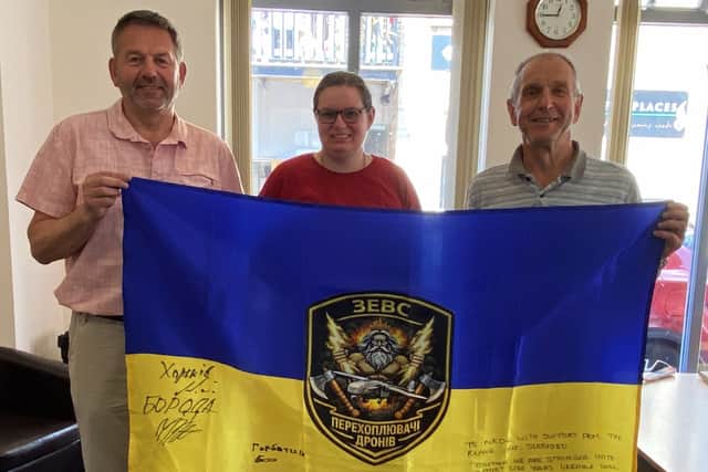 L-R Cllr Richard Wright (NKDC), Kelly Teasdale (Sivill Service), Tim Grigg (SleafordCAN)