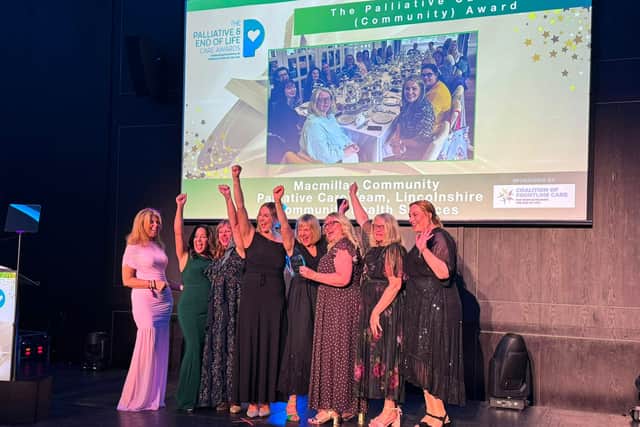 Macmillan Community Palliative Team collecting their trophy