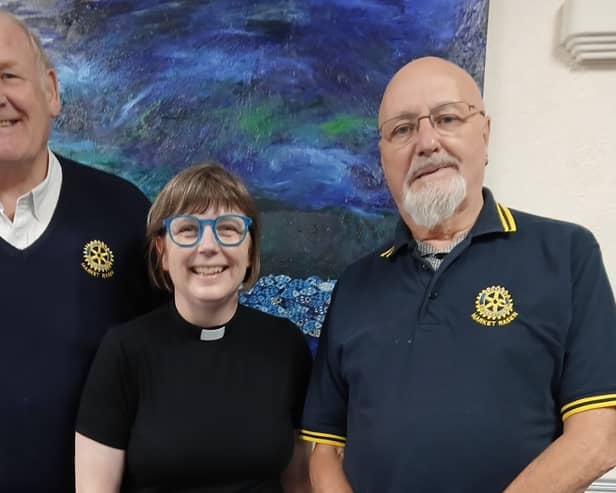 President Elect Rotarian Graham Davis and speaker host John Moore welcome Eleanor Robertshaw, Archdeacon of Lindsey and Stow