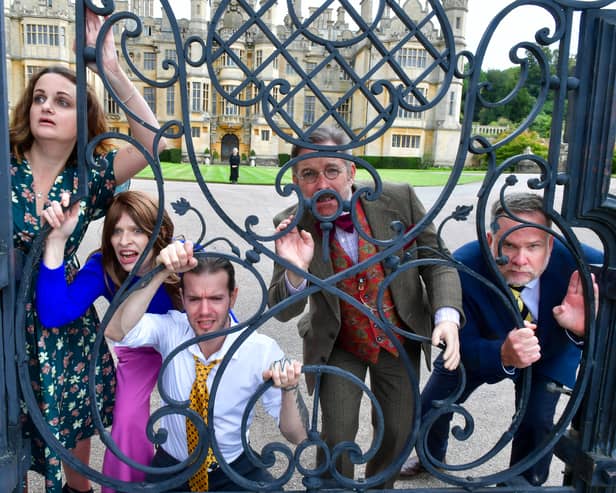 The cast of The Haunting of Hill House on location at Harlaxton Manor.