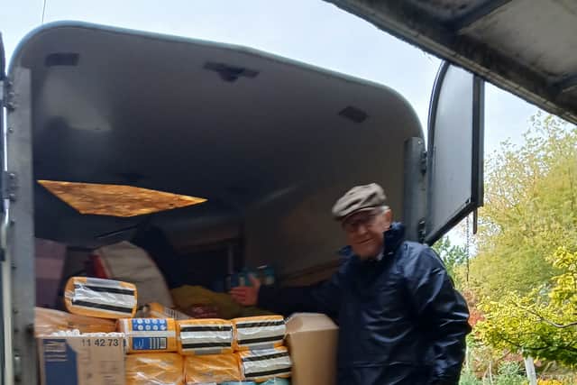 Rtn. David Mason tops out the consignment