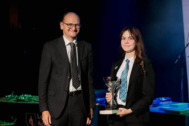 Lincolnshire Gateway Academies Trust’s Chief Executive Officer Martin Brown presents his award.
