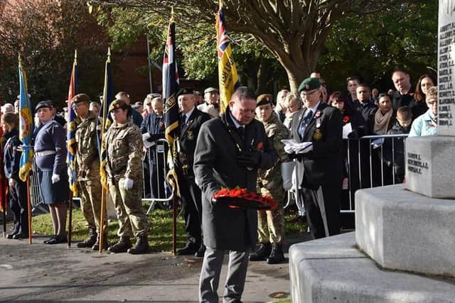 Mayor of Skegness Coun Mark Dannatt lays a wreath on behalf of Skegness Town Council.