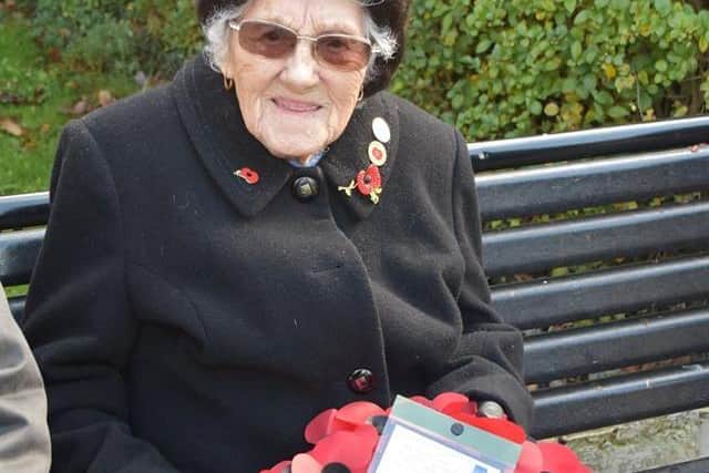 Maraget Cherry with the Royal Army Service Corp wreath at Skegness Remembrance Parade. Photo: Barry Robinson.
