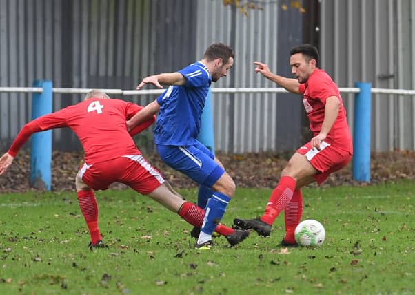 Boston Town v Cogenhoe football action.