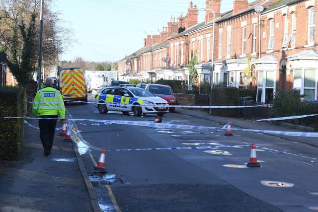 A police cordon remained in place today
