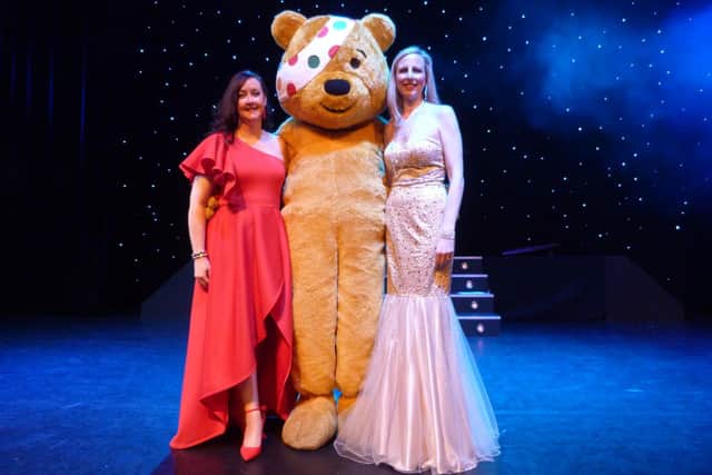 Miss Kerry and Miss Clare with Pudsey at the Children in Need Variety Show.