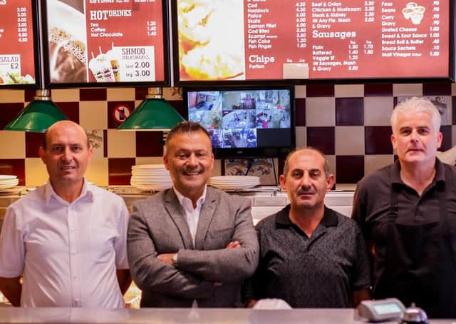 Sezgin 'Sam' Clark (second from left) says he is 'delighted' to be back at Tates.
