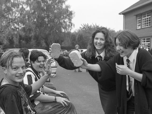 Joanne Ladds and Lindsey Paul throw wet sponges at Joe Vaughan and Jack Fairman.