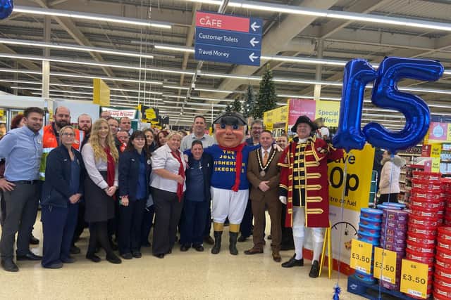 Mayor Coun Mark Dannatt, Town Crier Steve O'Dare and the Jolly Fisherman join management and staff at Tesco in Skegness for the 15th anniversary of the store.