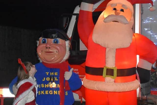 The Jolly Fisherman gives Santa the thumbs-up. Photo: Jolly Fisherman.