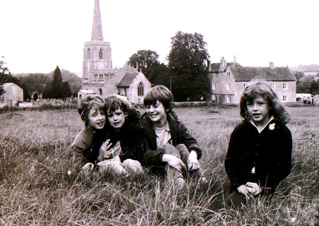 A scene from the fields around Ancaster church in 1970 - were you one of these village youngsters? EMN-191112-165214001