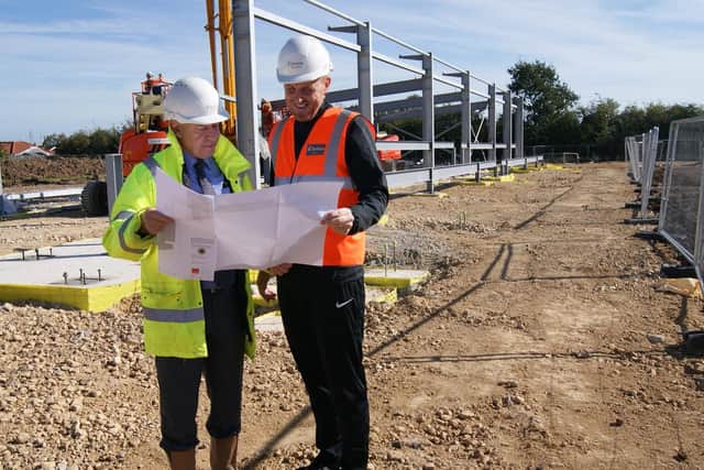 David Newton and manager Craig Elliott on site.
