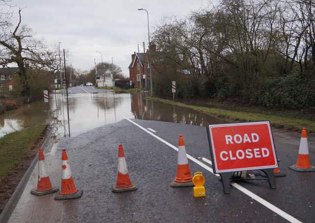 Flooding on the A46 near the Holton le Moor crossing. Picture by Dianne Tuckett EMN-191213-132517001