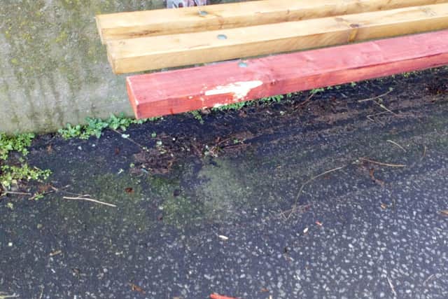 Another theory is the benches have been chipped away with something sharp,