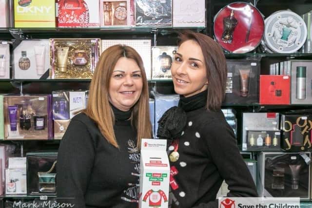 Smile please for Christmas at Facial Attraction.Photo: Mark Mason. ANL-191221-093210001