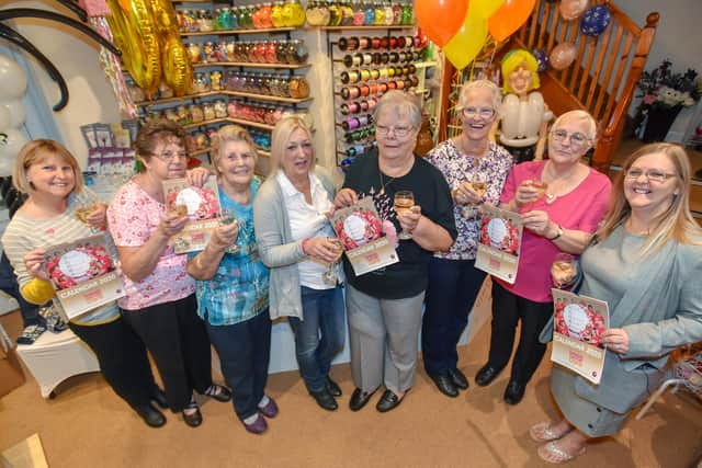 Inspirational women who all survived breast cancer at their charity calendar launch.