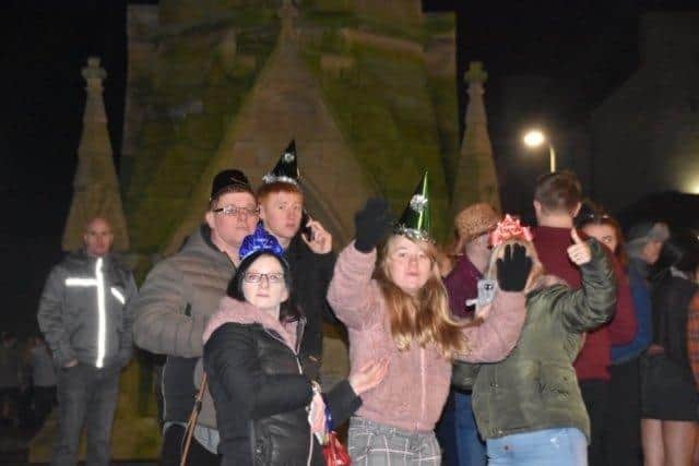 It is tradition on New Year's Eve to wear fancy dress. Photo: Barry Robinson. ANL-200201-112145001