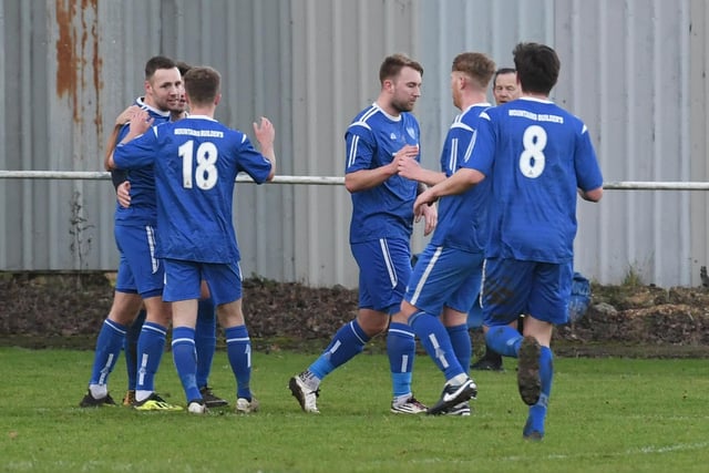 The Poachers celebrate.