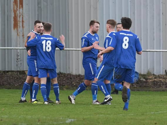 The Poachers celebrate.